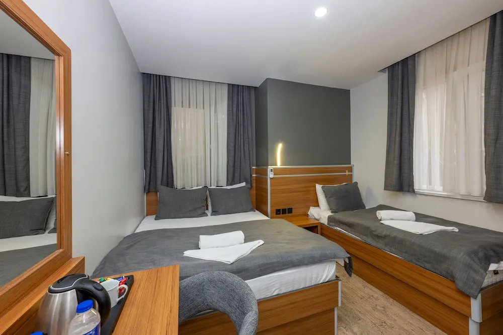 Deluxe Üç Kişilik Oda