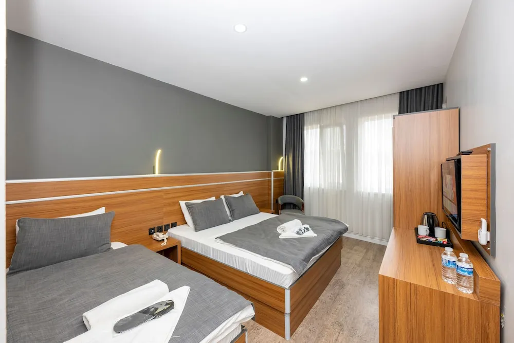 Deluxe Üç Kişilik Oda
