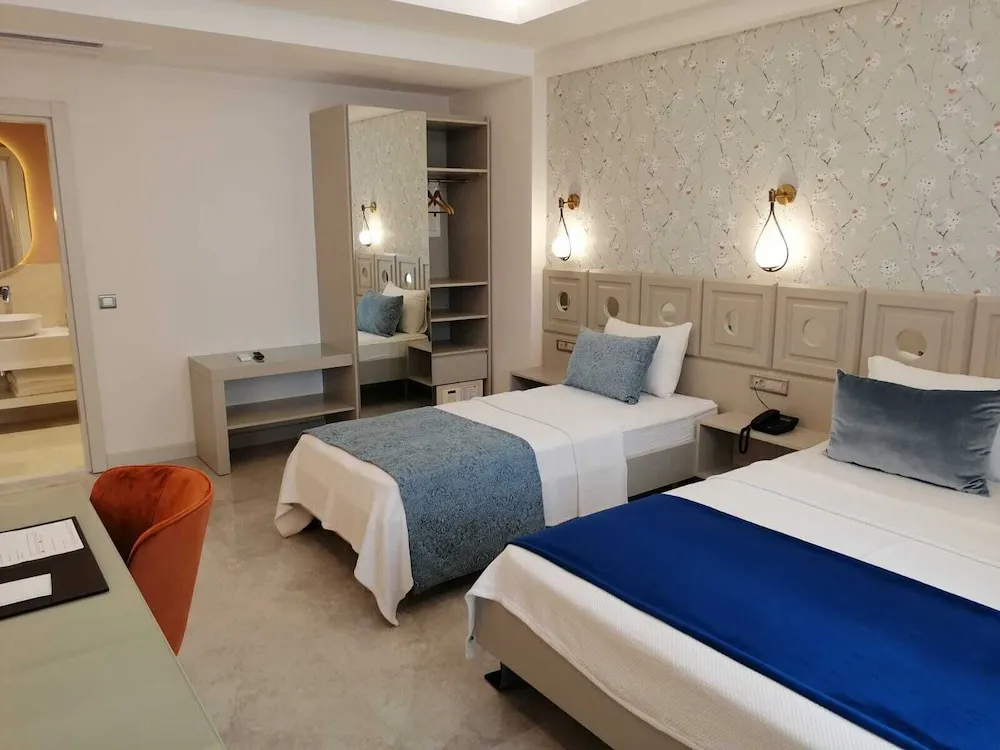 Deluxe Üç Kişilik Oda