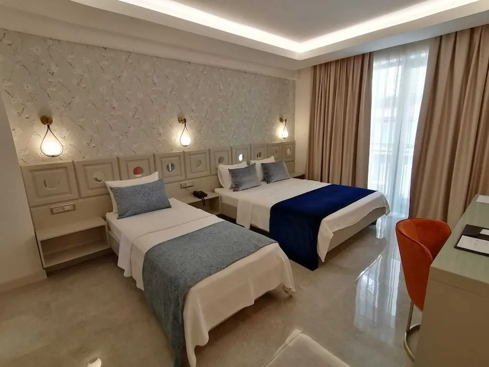 Deluxe Üç Kişilik Oda