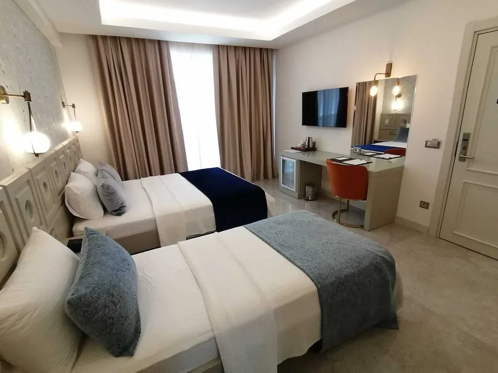 Deluxe Üç Kişilik Oda