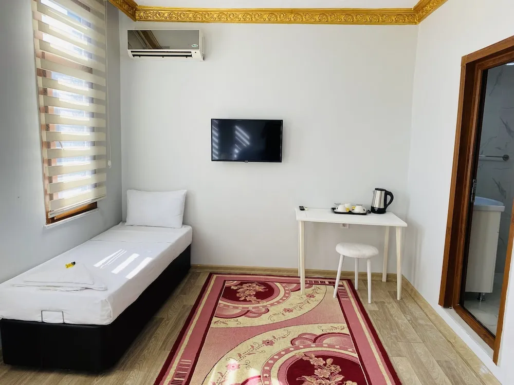 Deluxe Üç Kişilik Oda