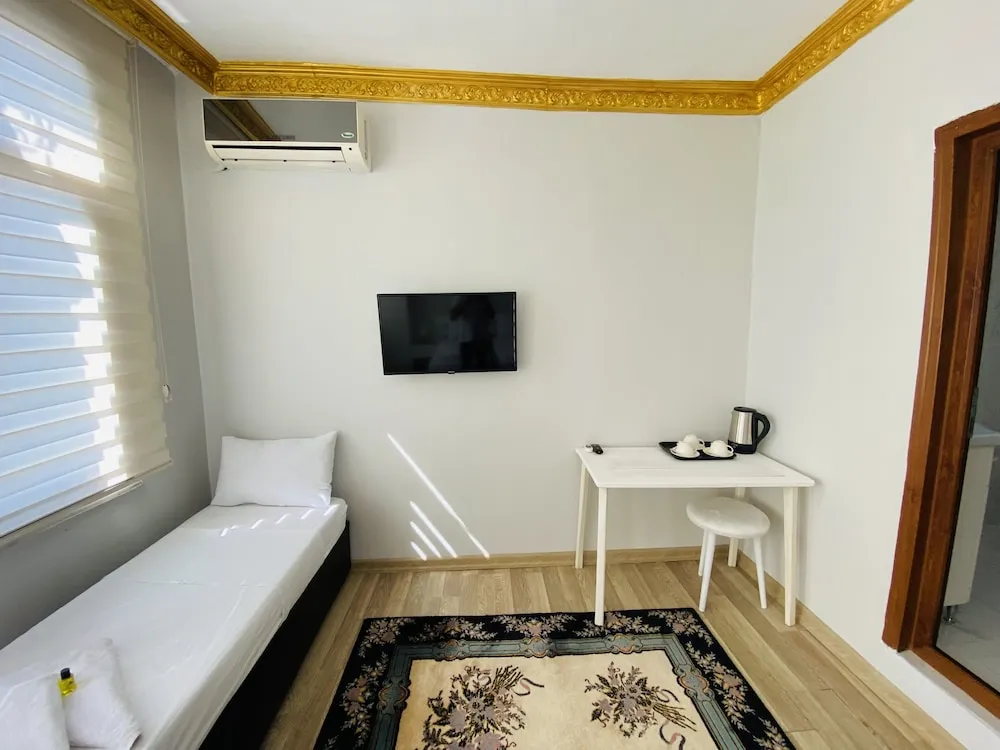 Deluxe Üç Kişilik Oda