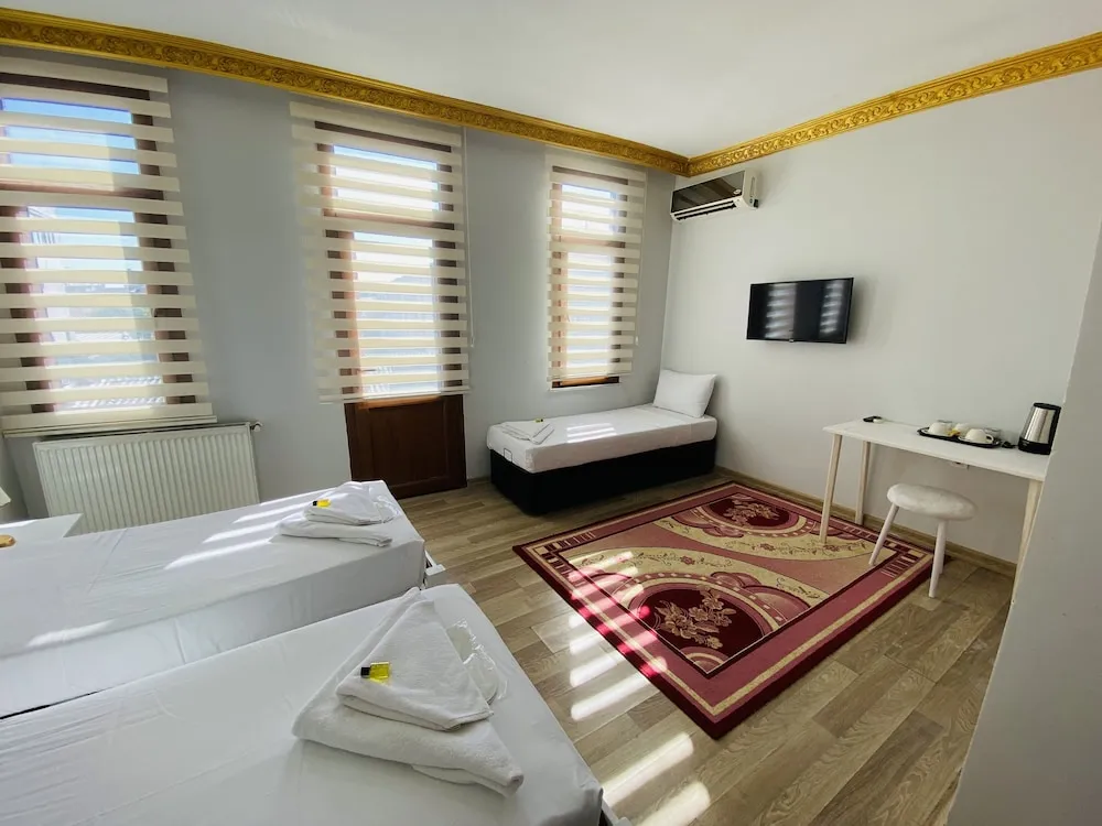 Deluxe Üç Kişilik Oda