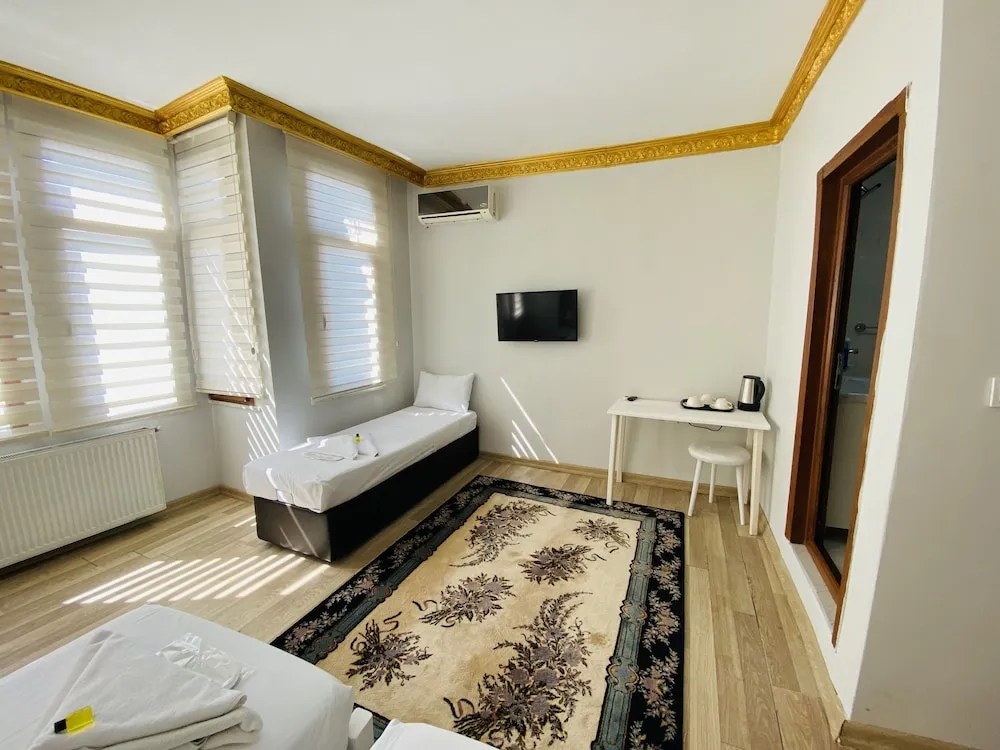 Deluxe Üç Kişilik Oda