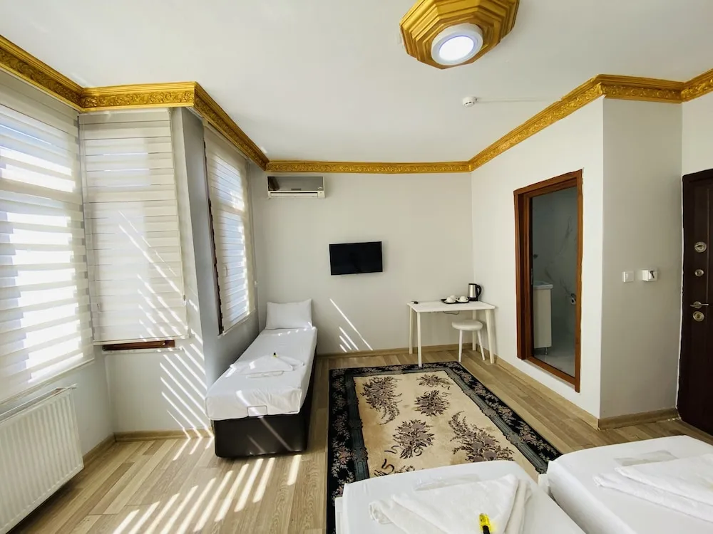 Deluxe Üç Kişilik Oda