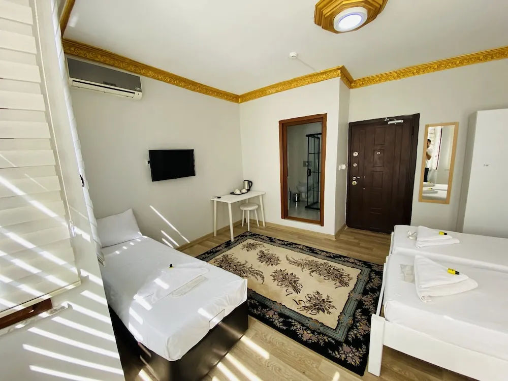 Deluxe Üç Kişilik Oda