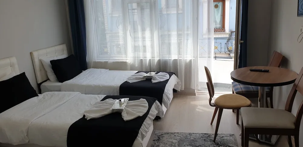 Deluxe Üç Kişilik Oda, Balkon