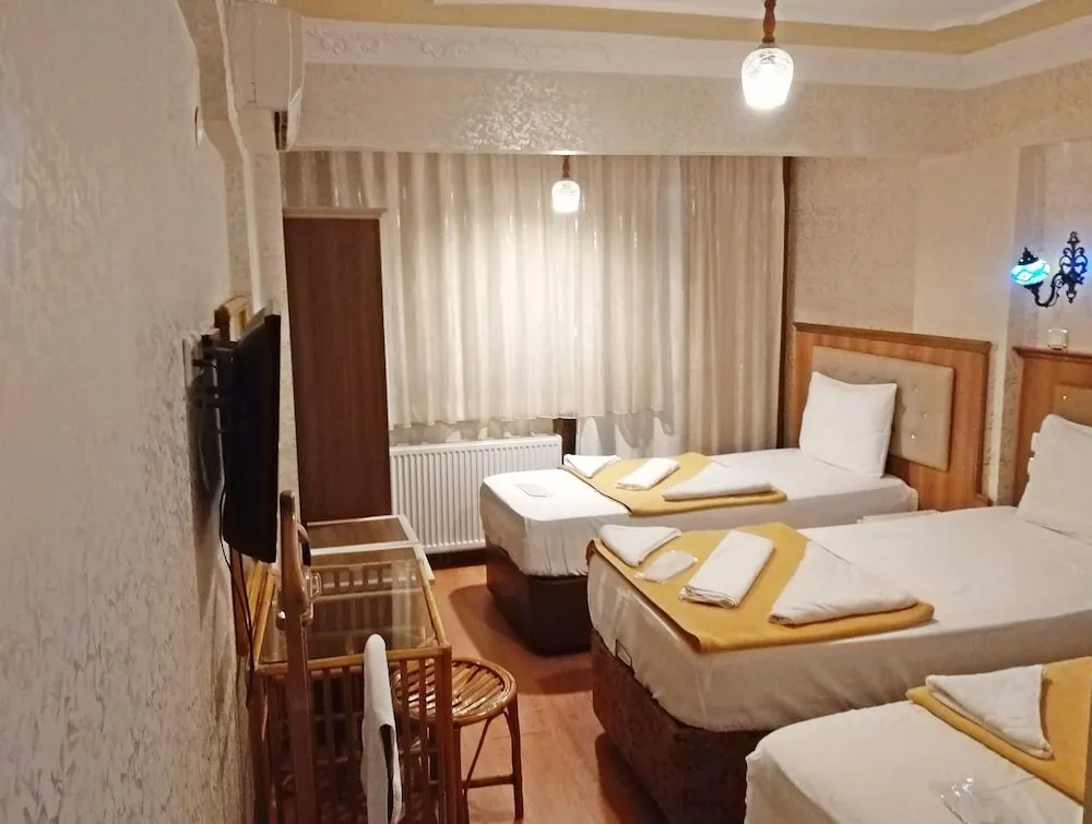 Üç Kişilik Oda
