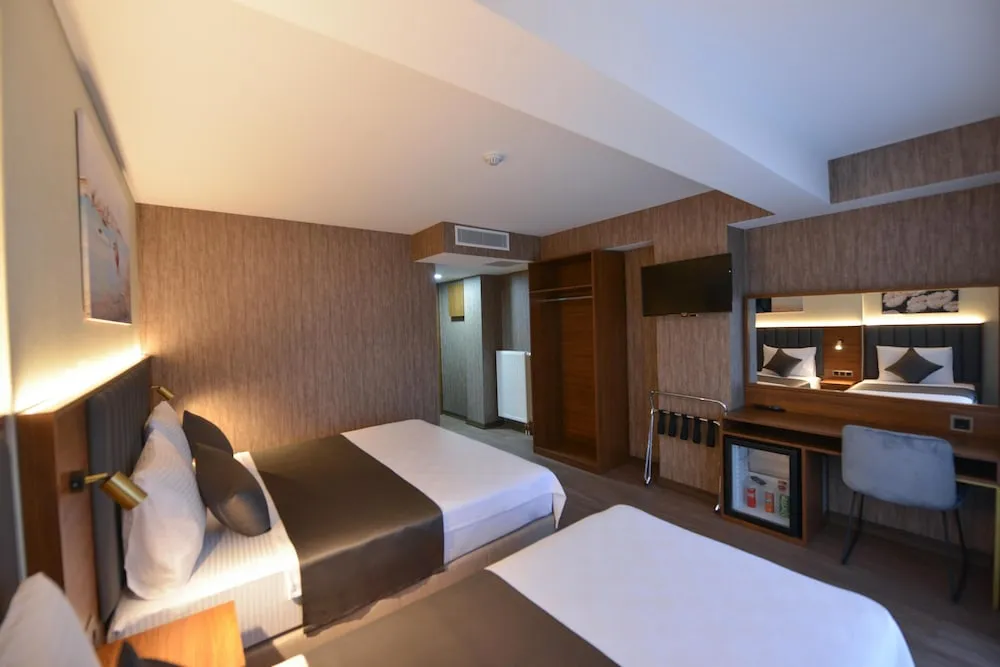 Deluxe Triple Room