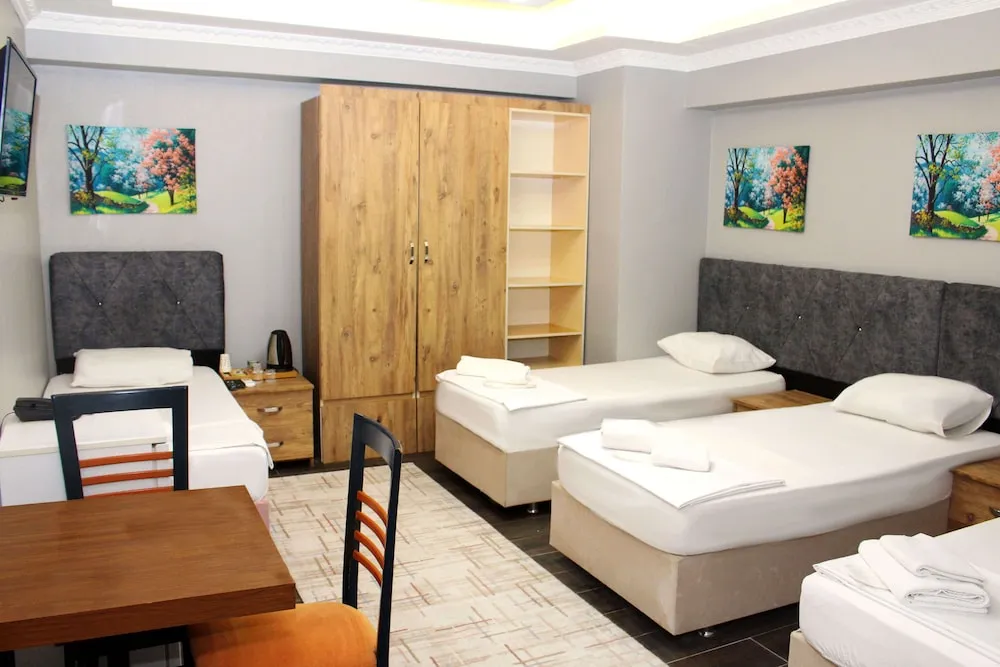 Business Dört Kişilik Oda