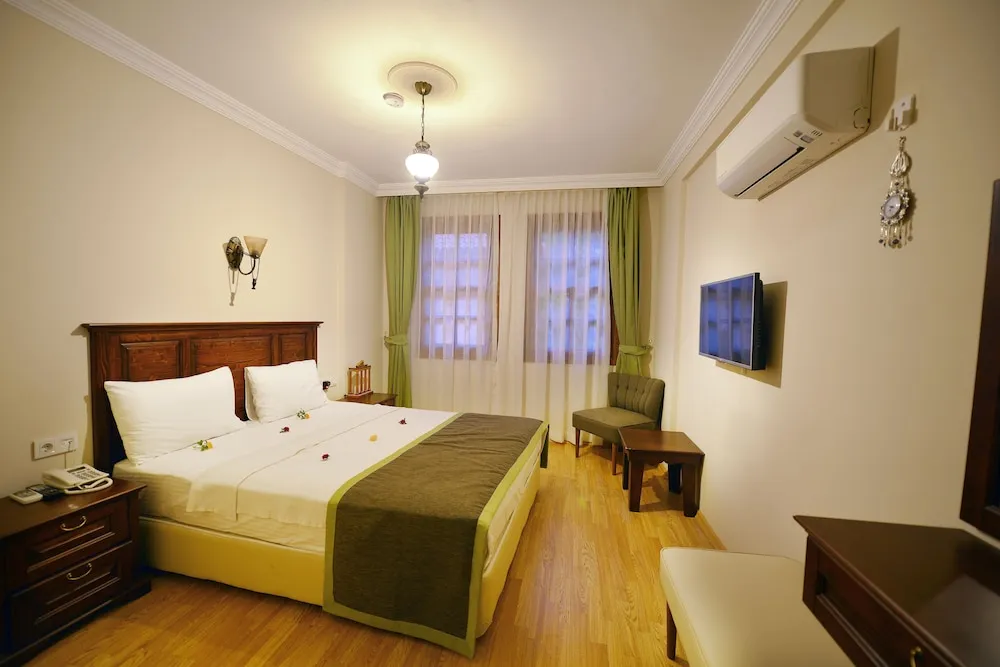 Deluxe Tek Büyük Yataklı Oda