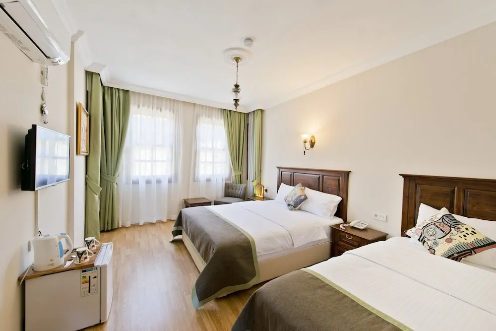 Deluxe Üç Kişilik Oda