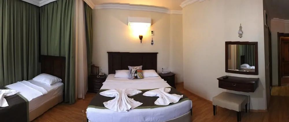 Deluxe Üç Kişilik Oda