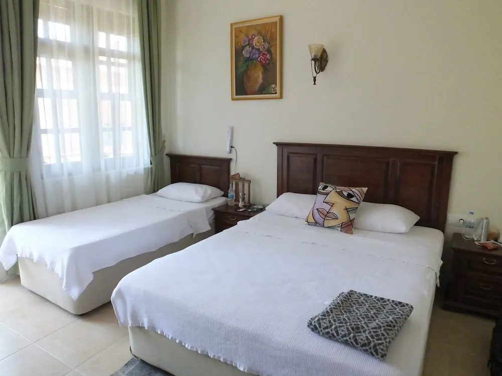 Deluxe Üç Kişilik Oda