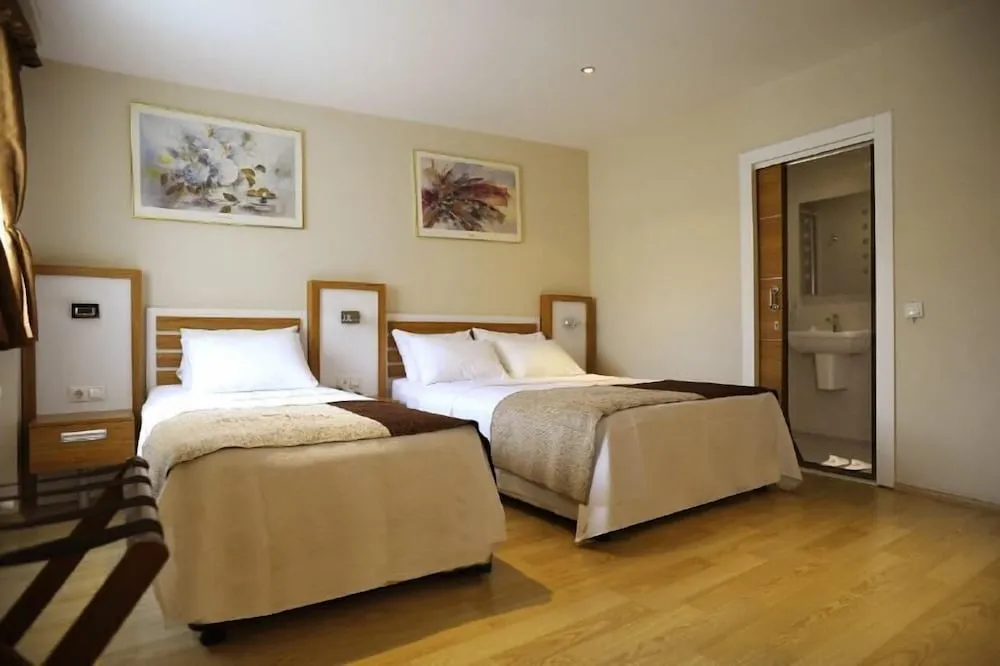 Deluxe Üç Kişilik Oda