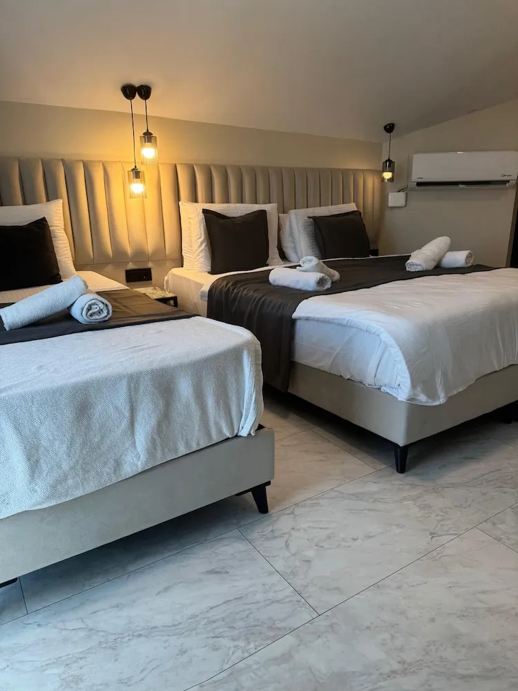 Deluxe Üç Kişilik Oda