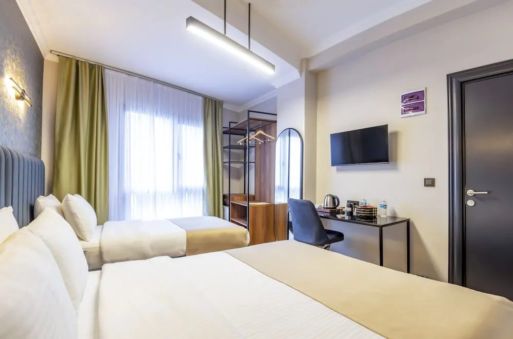 Deluxe Üç Kişilik Oda