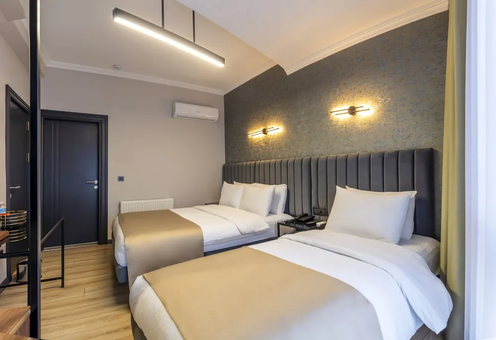 Deluxe Üç Kişilik Oda