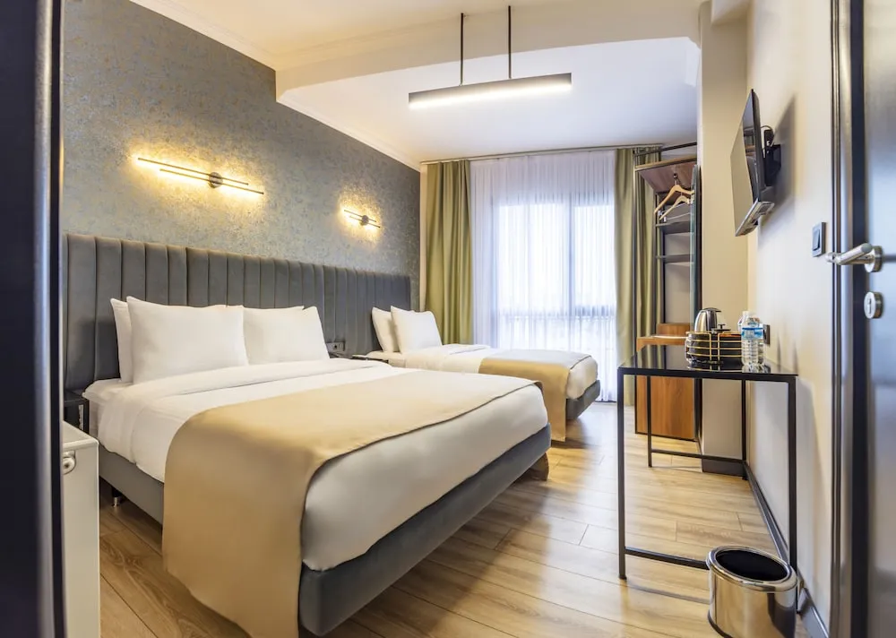 Deluxe Üç Kişilik Oda