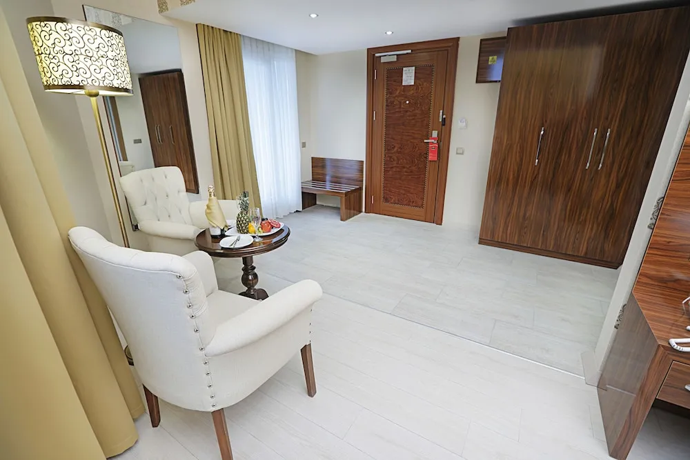 Deluxe Tek Büyük veya İki Ayrı Yataklı Oda