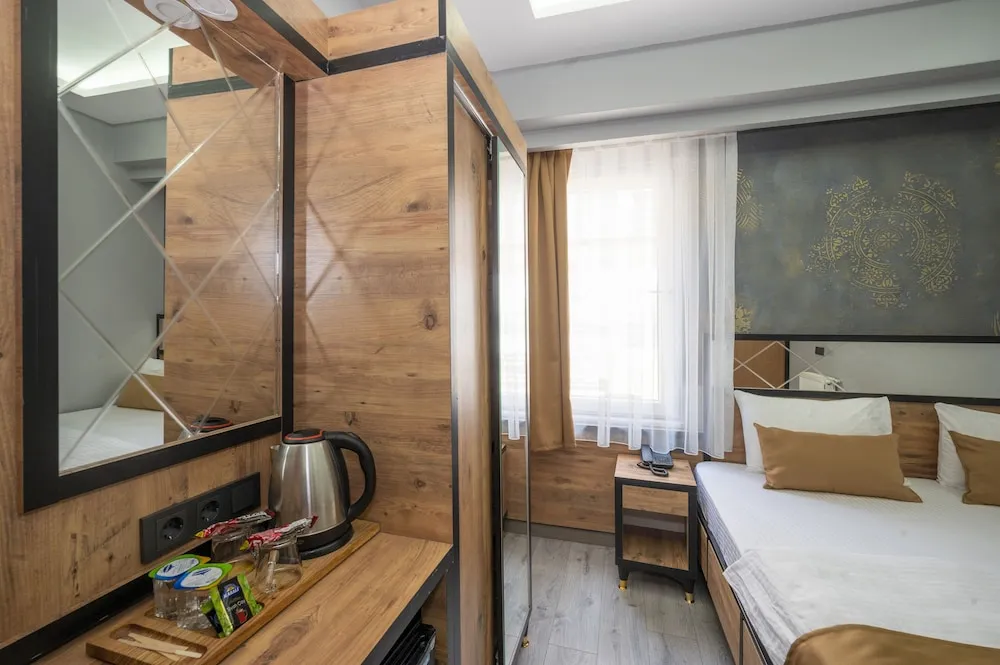 Deluxe Tek Büyük veya İki Ayrı Yataklı Oda