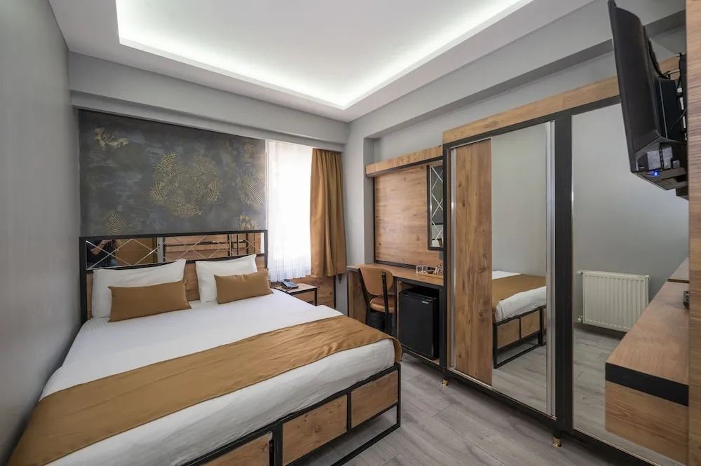 Deluxe Tek Büyük veya İki Ayrı Yataklı Oda