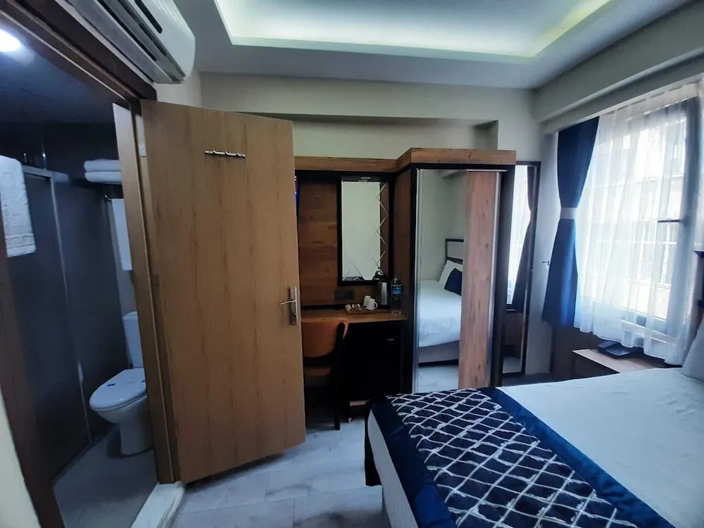 Deluxe Tek Büyük veya İki Ayrı Yataklı Oda