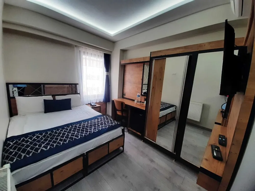 Deluxe Tek Büyük veya İki Ayrı Yataklı Oda