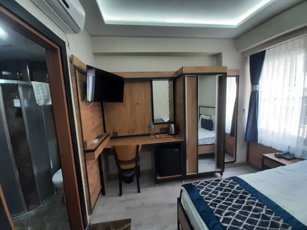 Deluxe Tek Büyük veya İki Ayrı Yataklı Oda