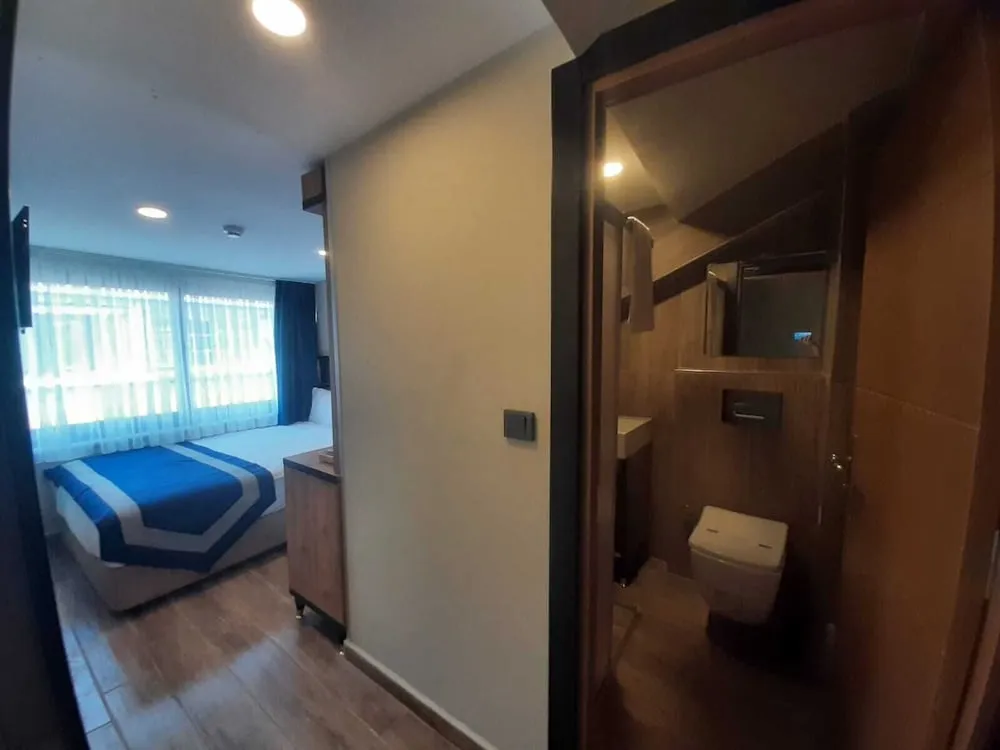 Deluxe Tek Büyük veya İki Ayrı Yataklı Oda