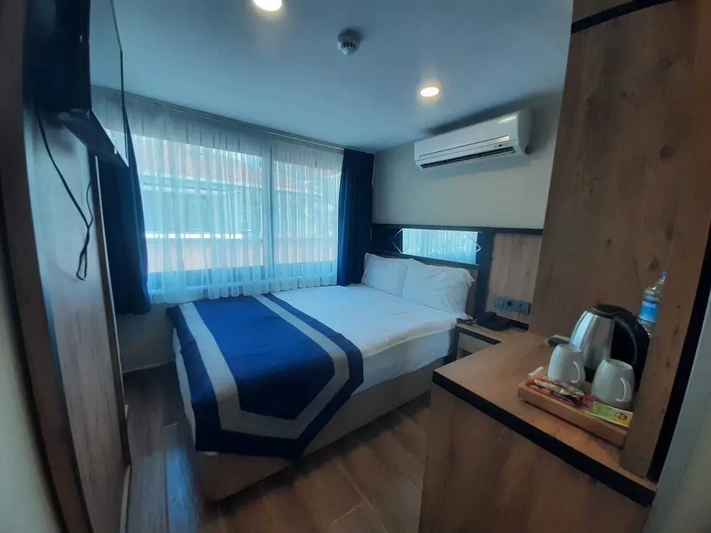 Deluxe Tek Büyük veya İki Ayrı Yataklı Oda