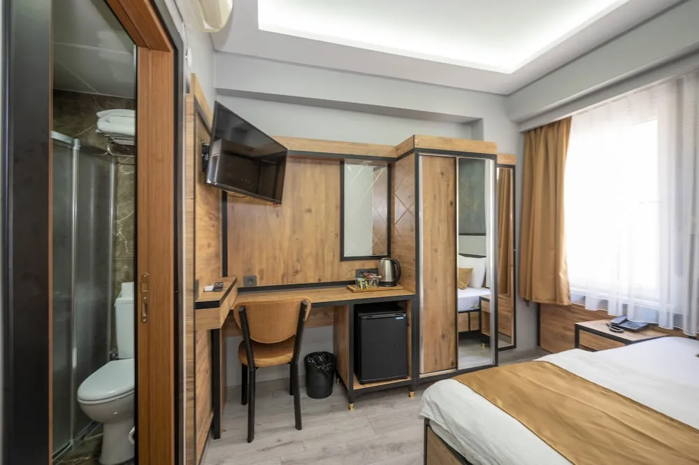 Deluxe Tek Büyük veya İki Ayrı Yataklı Oda