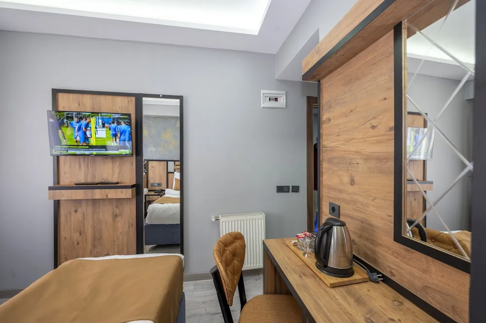 Deluxe Tek Büyük veya İki Ayrı Yataklı Oda