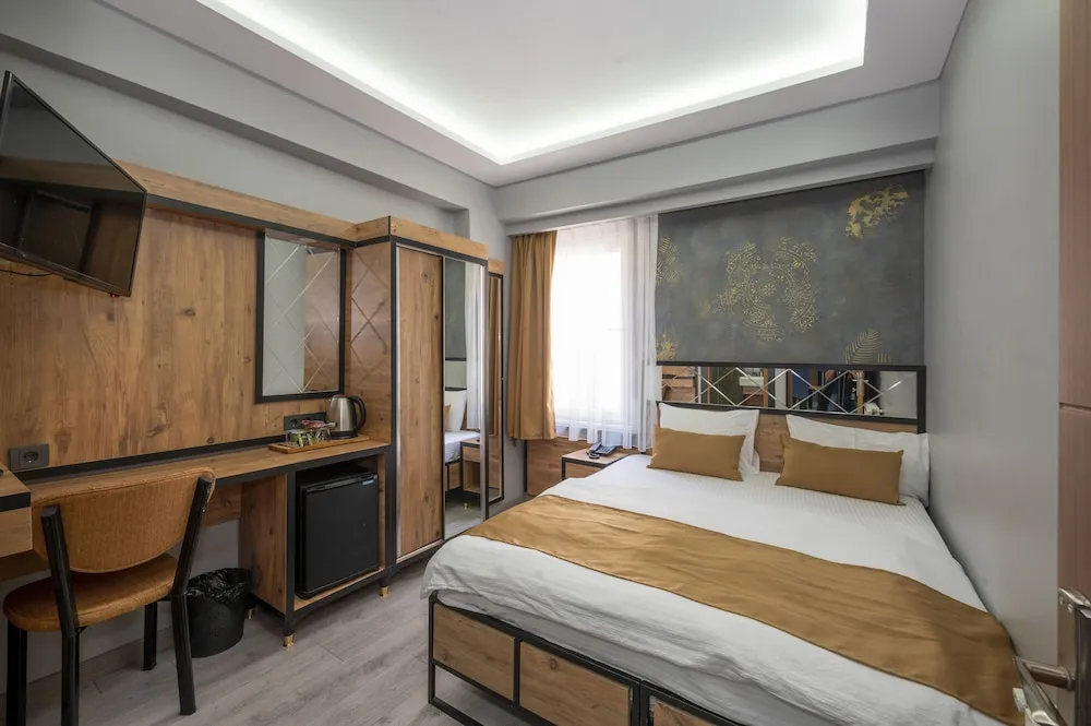 Deluxe Tek Büyük veya İki Ayrı Yataklı Oda