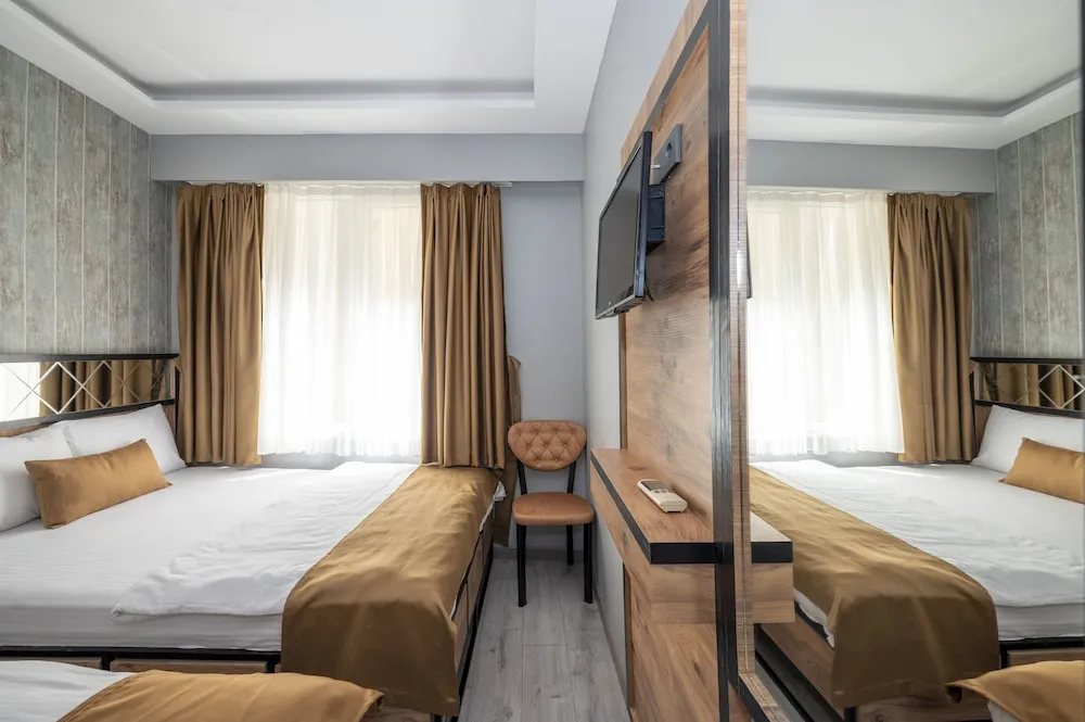 Deluxe Tek Büyük veya İki Ayrı Yataklı Oda