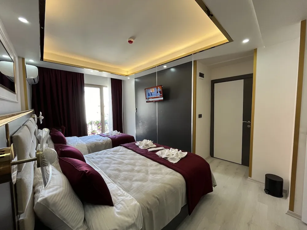 Deluxe Üç Kişilik Oda