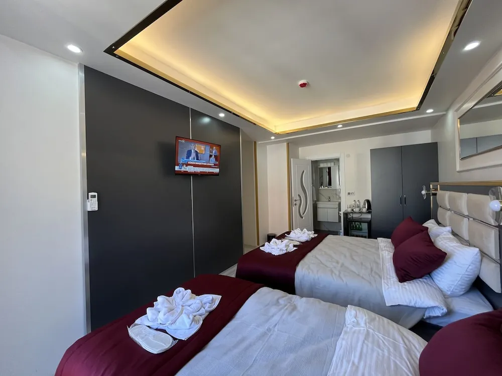 Deluxe Üç Kişilik Oda