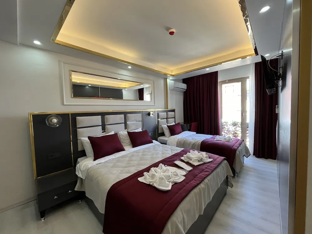 Deluxe Üç Kişilik Oda