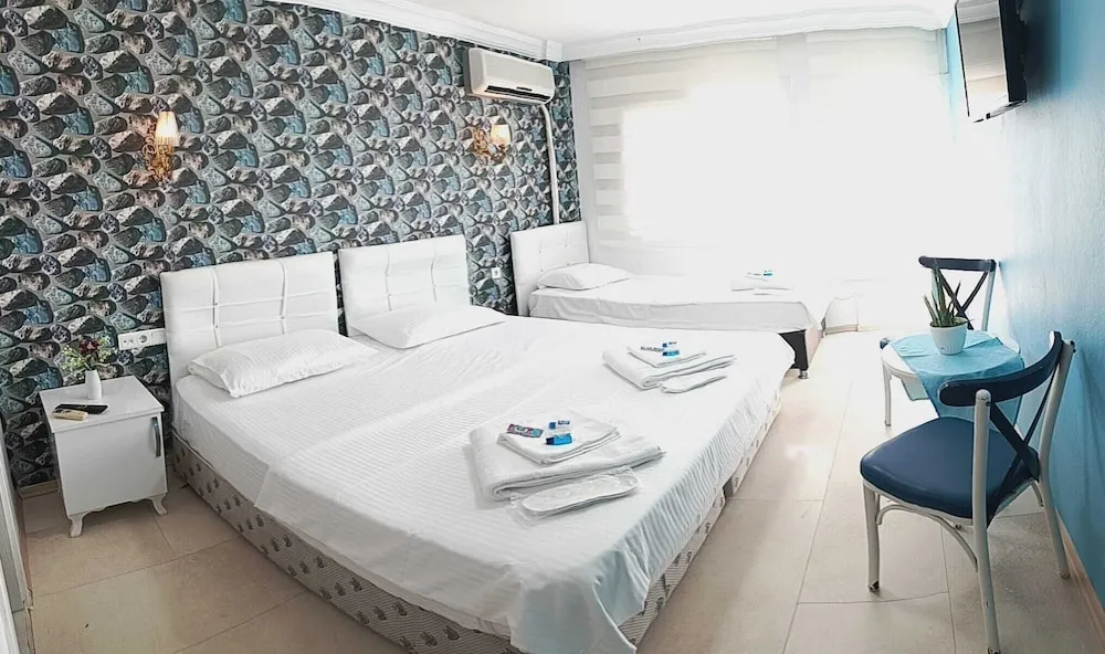 Family Tek Büyük veya İki Ayrı Yataklı Oda, Plaj Manzaralı