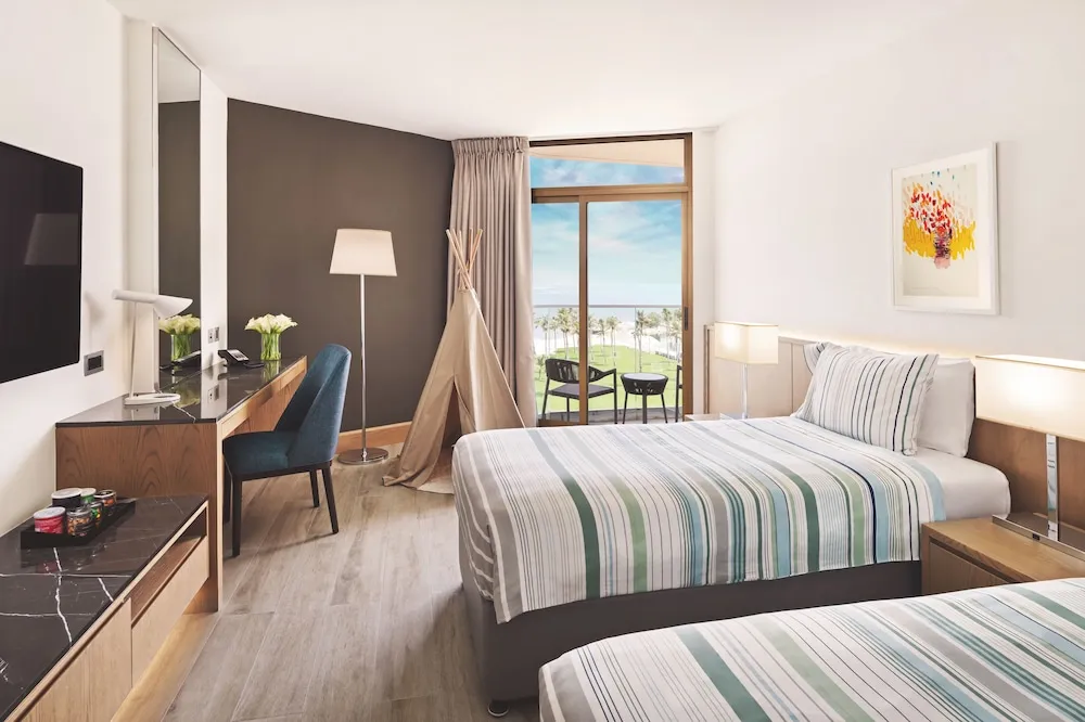 Family Sea View Room with Splash Park & Beach Access with Free Shuttle to Shopping Malls