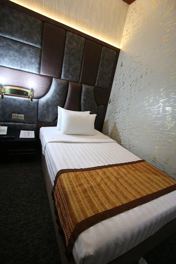 Deluxe Tek Büyük veya İki Ayrı Yataklı Oda