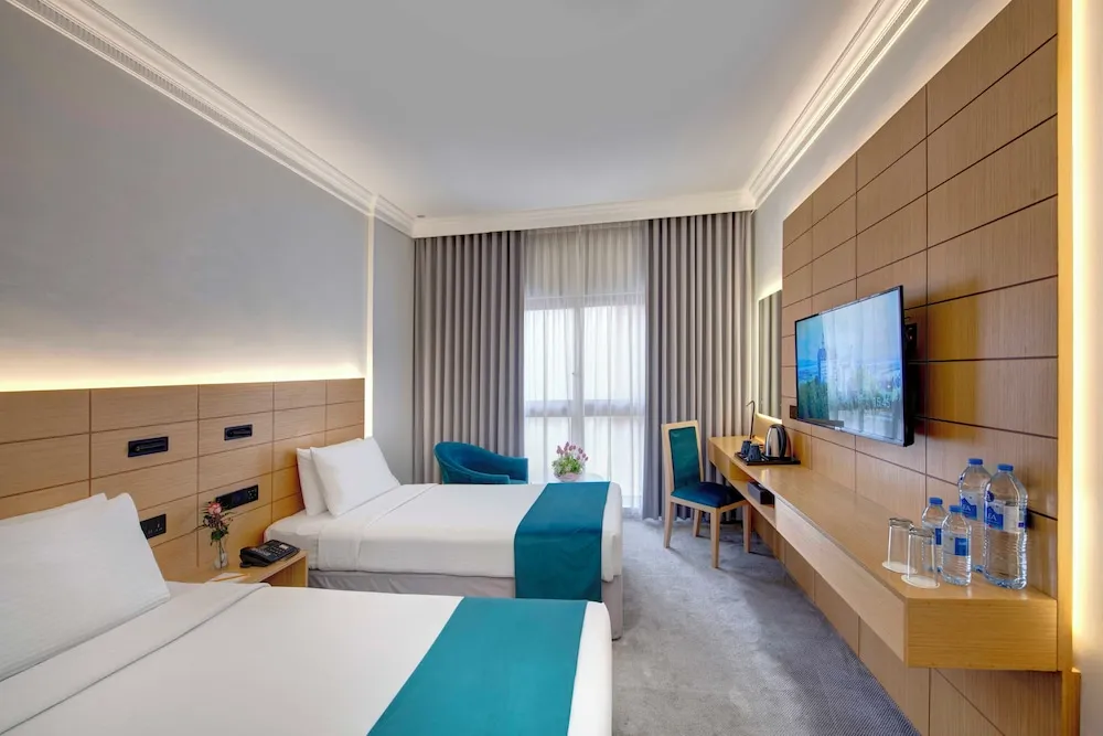 Deluxe Tek Büyük veya İki Ayrı Yataklı Oda