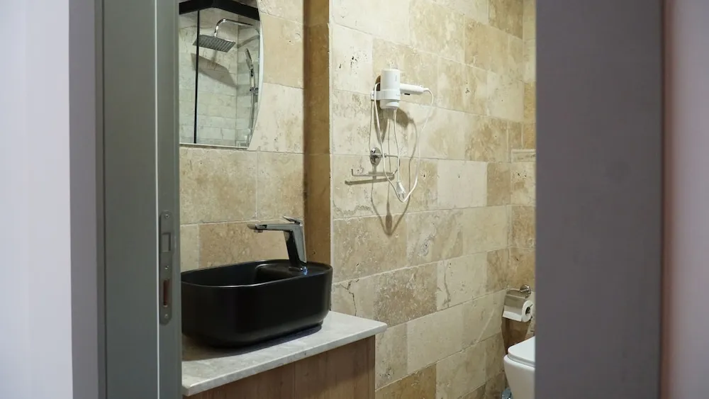 Deluxe Üç Kişilik Oda