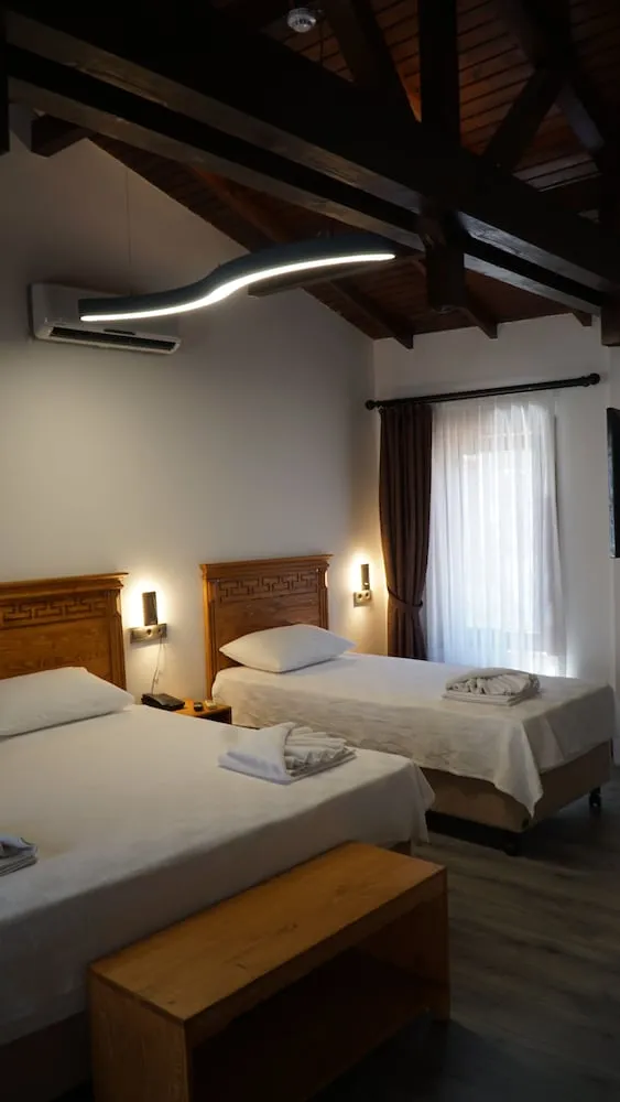 Deluxe Üç Kişilik Oda