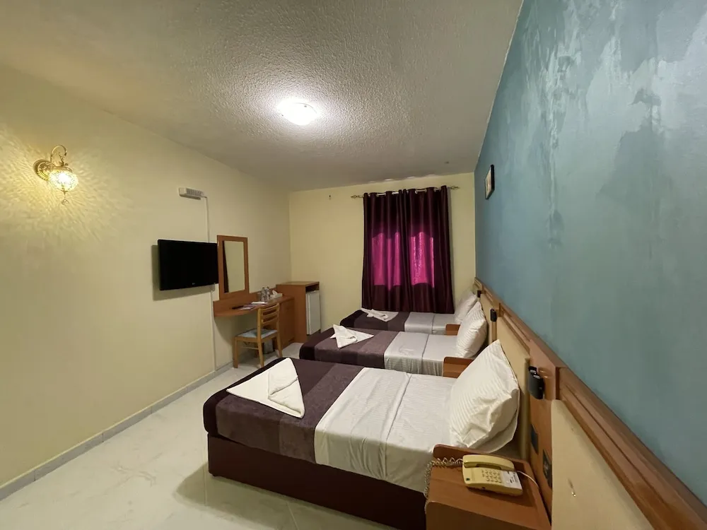 Deluxe Üç Kişilik Oda