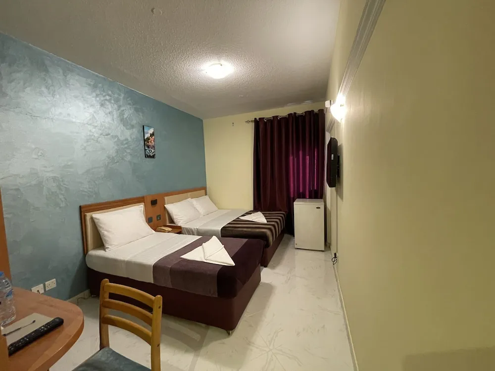 Deluxe Tek Büyük veya İki Ayrı Yataklı Oda