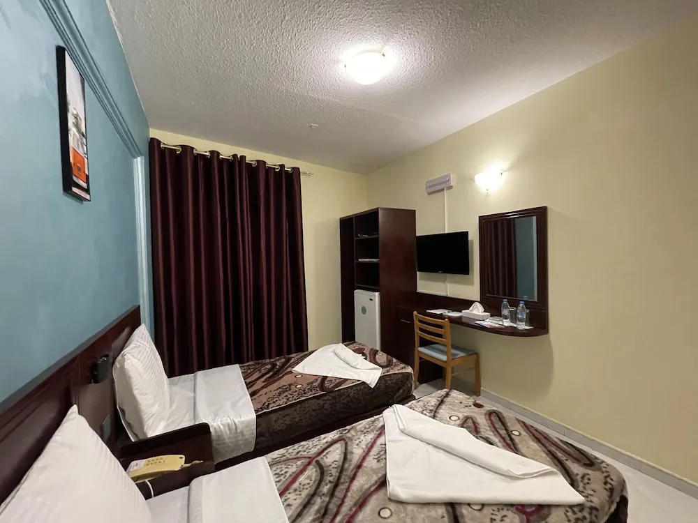 Deluxe Tek Büyük veya İki Ayrı Yataklı Oda