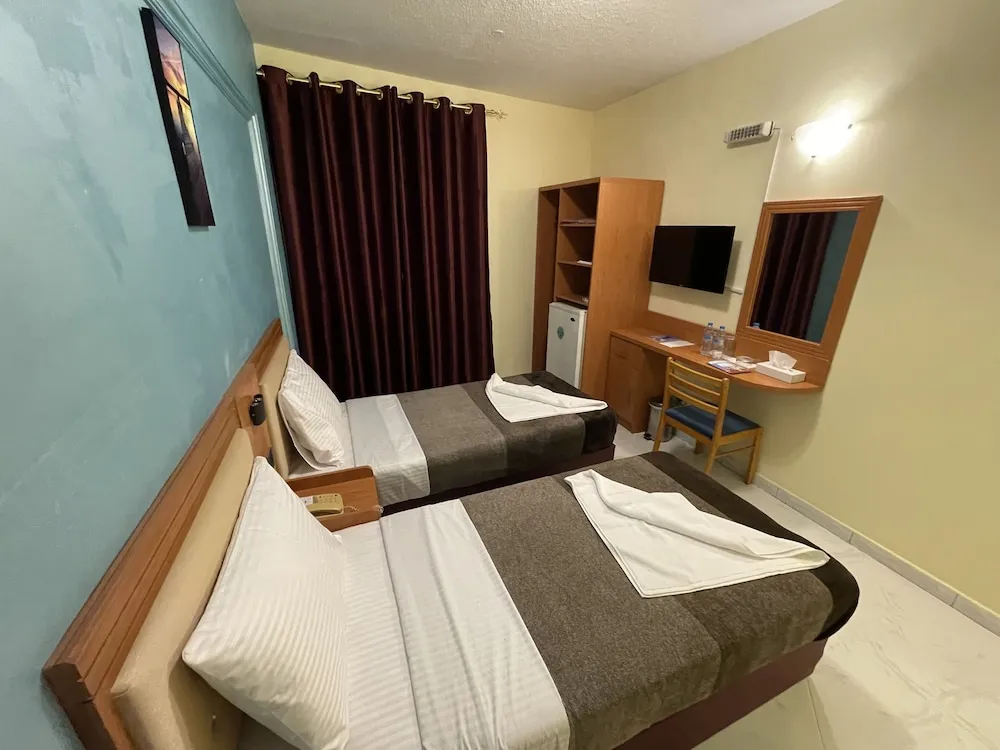 Deluxe Tek Büyük veya İki Ayrı Yataklı Oda