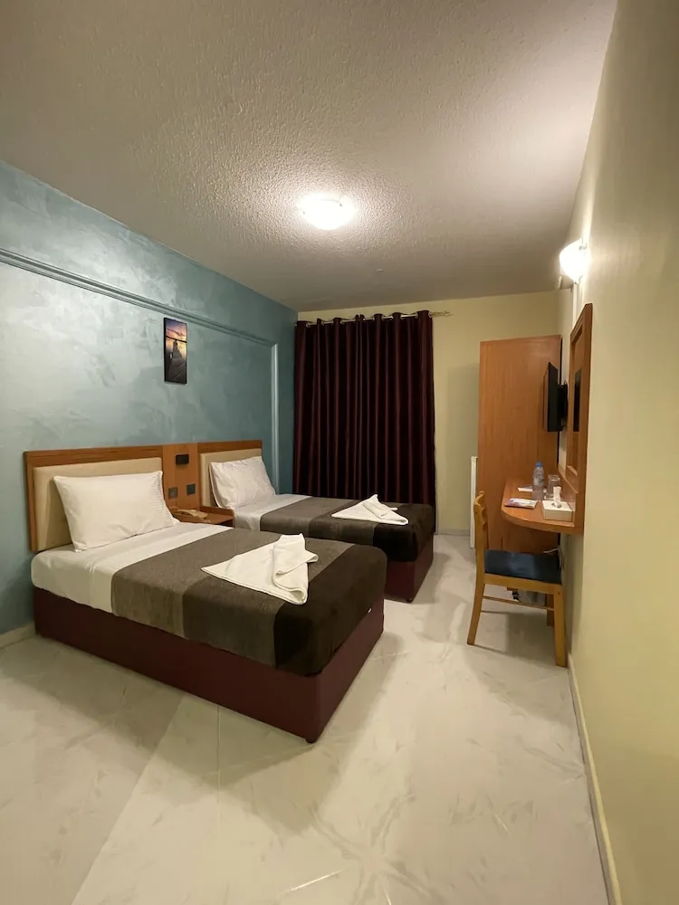 Deluxe Tek Büyük veya İki Ayrı Yataklı Oda